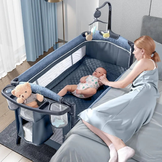 Bassinet Bedside Crib Pack and Play with Sheet Diaper Changing Table and Music Mobile Portable for Newborn to Toddlers