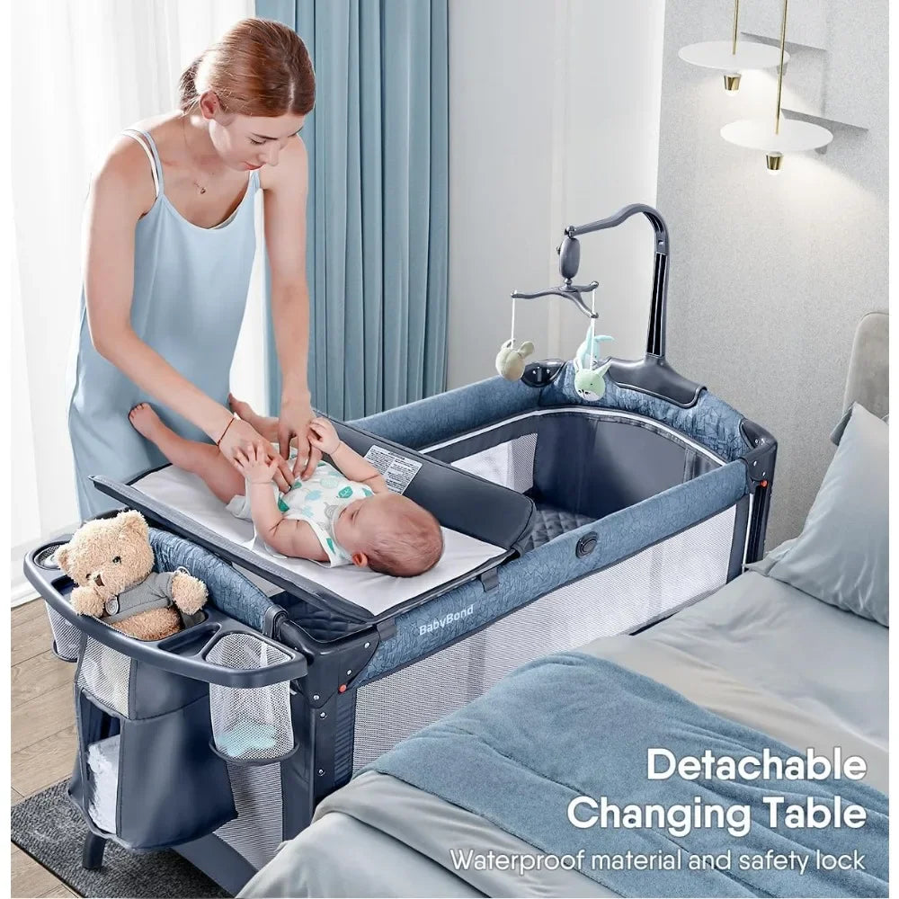 Bassinet Bedside Crib Pack and Play with Sheet Diaper Changing Table and Music Mobile Portable for Newborn to Toddlers
